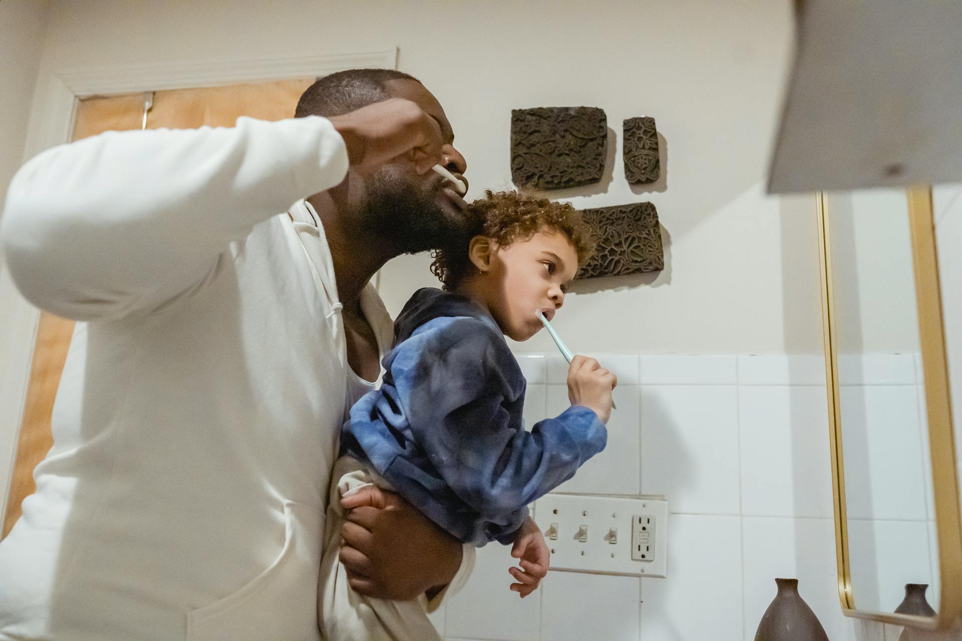 Children learn a lot by observing their parents and caregivers. Demonstrate the importance of routines by adhering to your own schedule. Show them how you plan your day, manage your time, and stay organized. Your behavior sets an example, making it easier for them to understand the benefits of routines. :: Pexels