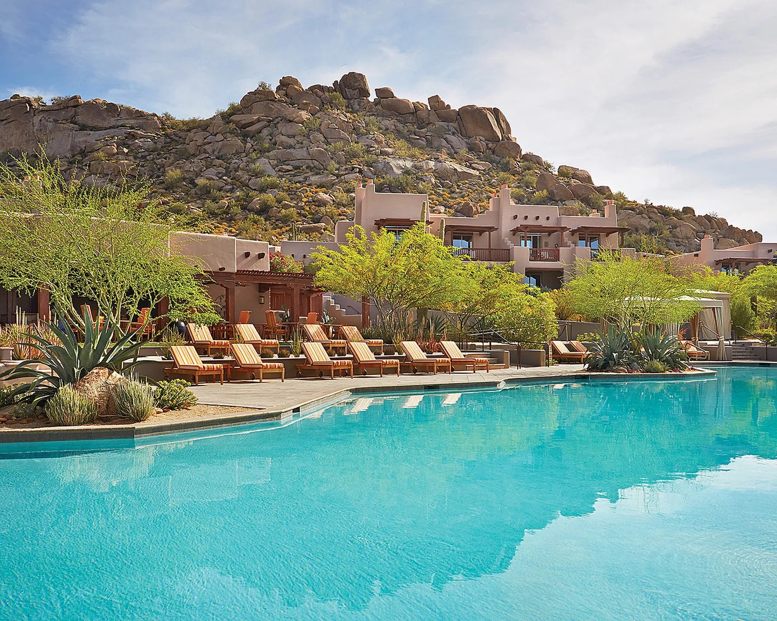 <p> Scottsdale is a haven for those seeking an active, outdoor lifestyle. With more than 300 days of sunshine per year, this Arizona city offers a plethora of golfing opportunities, upscale shopping, and luxurious spas. The city's extensive network of hiking trails and parks, such as Camelback Mountain and Pinnacle Peak Park, provide endless adventures. Additionally, the thriving arts scene and numerous cultural festivals ensure that there's always something to do. </p>:: Vogue