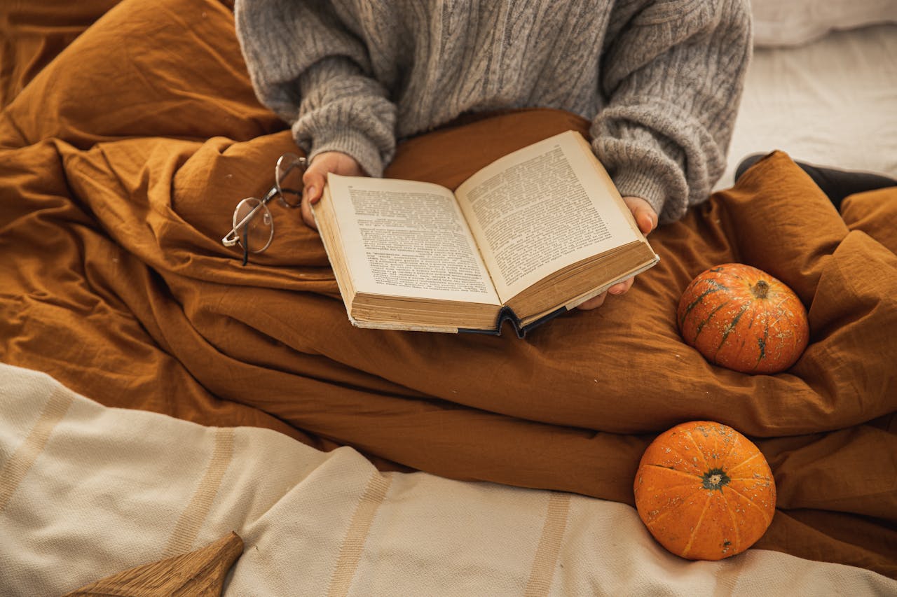 <p> As the days grow shorter and the air turns crisp, October invites us to embrace the coziness of autumn. There’s nothing quite like curling up with a warm blanket and a captivating book as the leaves change color and fall from the trees. Whether you’re drawn to thrilling mysteries, heartwarming tales, or thought-provoking nonfiction, this fall reading list offers a diverse selection of books perfect for the season. In this article, we’ll explore seven must-read titles that will engage your imagination and complement the beauty of October, providing you with the ideal reading experience as you sip your favorite seasonal beverage. </p> :: Pexels