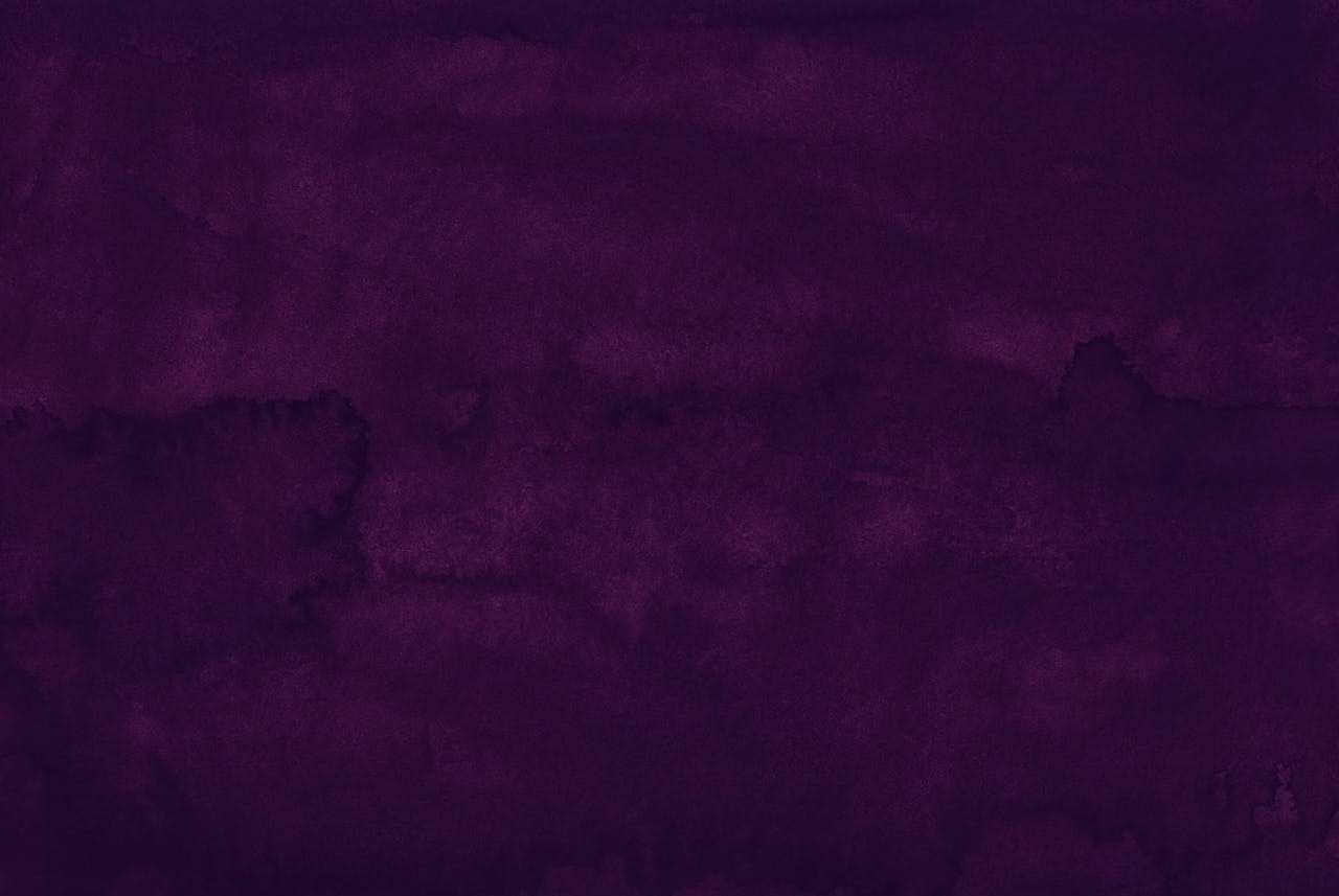 <p> Dark purple is another color that can create a dramatic and intense atmosphere, but it’s not always the best choice for a living room. While purple is often associated with luxury and sophistication, dark purple can make a room feel smaller and more closed off, especially in spaces with limited natural light. Dark shades of purple can also make the room feel heavy and oppressive, which is not ideal for a space that should promote relaxation and socializing. If you love purple, consider using lighter shades like lavender, lilac, or soft mauve. These colors can add a touch of elegance and tranquility to the room without overwhelming the space. Lighter purples also help to create a more open and airy feel, making the room feel more expansive. </p> :: Pexels