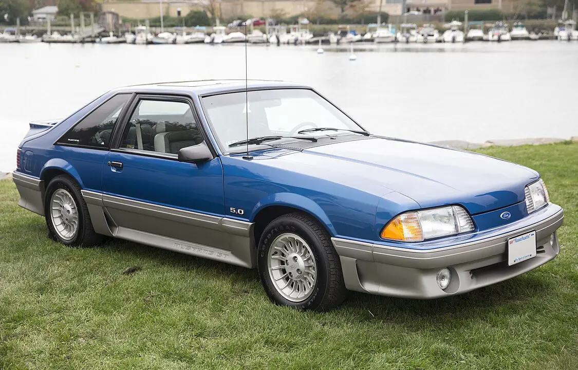 <p>The Fox Body Mustang (1979-1993) became a platform for endless customization. Its lightweight design and powerful V8 engine options made it a hit among drag racers and car enthusiasts. The car’s simple, clean lines and removable roof options added to its appeal.</p> ::Mr.choppers