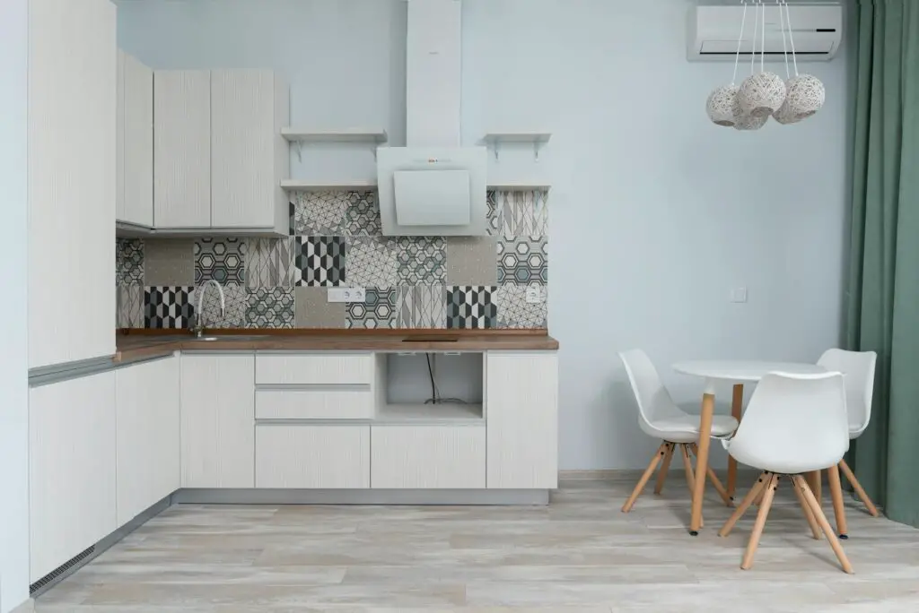 <p>Kitchen or bathroom tiles looking dated? Peel-and-stick backsplash tiles are your best friend. They’re waterproof, easy to clean, and come in designs that mimic real tile, stone, or wood. They stick right onto existing surfaces and peel off without damage. Photos of stunning faux marble or classic subway tiles are easy to find online. This small update packs a big punch and makes cooking or washing up feel much nicer.</p> ::Pexels