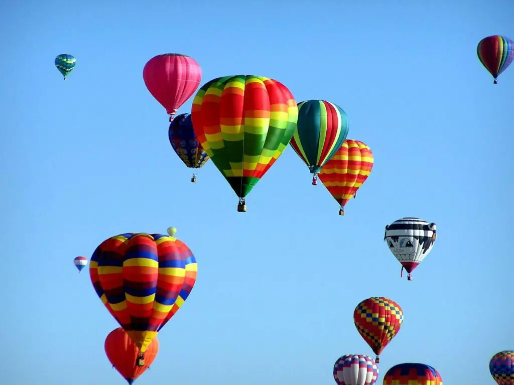 <p>Watching dozens of colorful balloons rise with the sun is one thing—floating up in one is another. Hot air balloon festivals happen worldwide, like the famous Albuquerque International Balloon Fiesta in the U.S. Riding in a balloon feels peaceful yet thrilling as you drift with the wind. The views stretch far, with nothing but sky around you. Balloons come in all shapes, from classic to crazy designs, which makes these festivals perfect for photos. It’s an easy way to see the world from a whole new angle.</p> ::Pexels