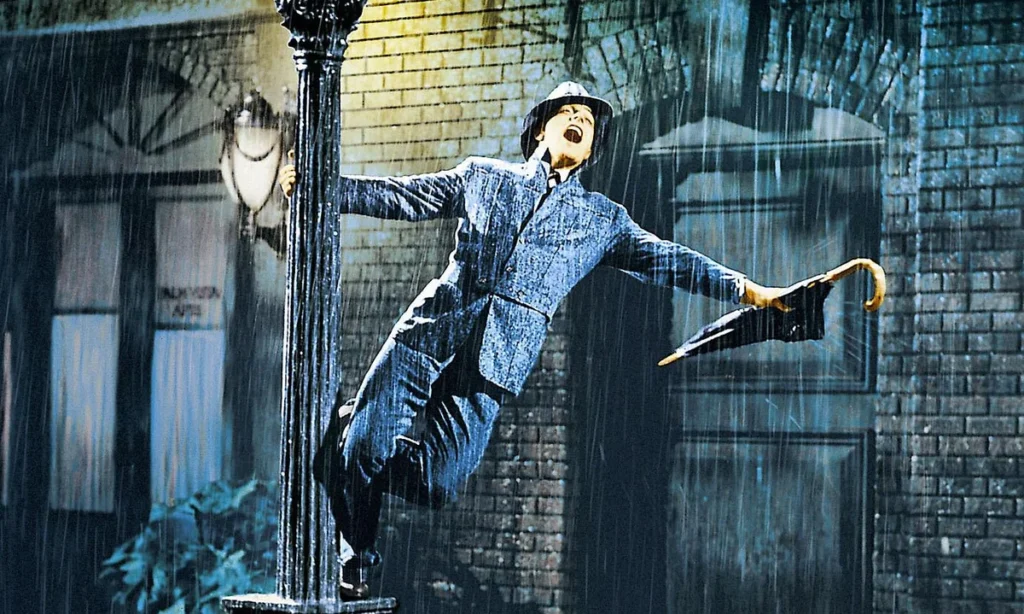 <p> When it comes to feel-good movies, few can match the charm and energy of Singin’ in the Rain. This dazzling musical comedy chronicles Hollywood’s transition from silent films to sound, featuring Gene Kelly’s iconic dance sequences that remain awe-inspiring decades later. The movie’s bright and catchy songs, witty humor, and infectious energy make it a joyous experience for viewers of all ages. Its celebration of the magic of movies, combined with playful romance and comedy, has cemented Singin’ in the Rain as one of the most beloved musicals of all time. Watching it is like stepping into a world of happiness and creativity that never loses its sparkle. </p> :: The Guardian