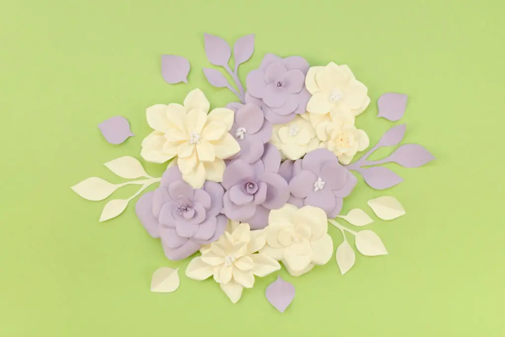 <p> If you love flowers but don't want to spend money on fresh blooms, why not create your own paper flowers? Using inexpensive materials like construction paper, tissue paper, or old magazines, you can easily craft beautiful flowers in any shape and color. There are countless tutorials online to help guide you through creating roses, daisies, tulips, and more. Paper flowers can be arranged into lovely bouquets, wreaths, or used as decorations for parties and special events. They also make thoughtful homemade gifts for birthdays and other celebrations. </p> :: Freepik