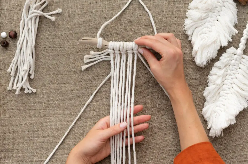 <p> Macramé, the art of knotting cords to create decorative items, is an increasingly popular hobby with a minimal supply list. All you need is some cotton cord or rope, scissors, and a place to hang your project while you work. Macramé is versatile—you can create wall hangings, plant hangers, keychains, or even jewelry by learning a few basic knots like the square knot and the half hitch. This tactile craft is not only fun but also helps improve hand coordination and patience. The bohemian vibe of macramé pieces makes them excellent for personalizing your living space or giving as heartfelt, handmade gifts. Even beginners can produce impressive results quickly, and as you gain confidence, you can explore more complex designs or incorporate beads and colored cords for added flair. </p> :: Pexels