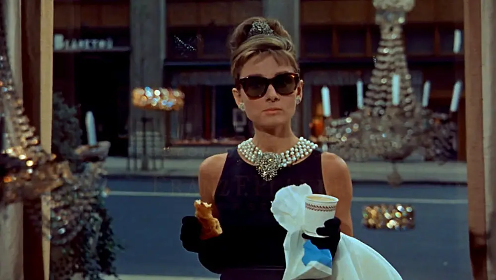 <p> Audrey Hepburn’s portrayal of Holly Golightly in Breakfast at Tiffany’s is the epitome of style and charisma. This romantic comedy-drama captures the whimsical and sometimes bittersweet life of a New York socialite searching for identity and love. The film’s unforgettable opening scene outside Tiffany’s jewelry store, combined with Henry Mancini’s iconic “Moon River” theme, creates a cinematic experience that is both glamorous and heartfelt. Beneath its sophisticated exterior, the movie explores themes of loneliness and self-discovery, which give it emotional depth. Whether you’re drawn to classic fashion, sharp wit, or compelling storytelling, Breakfast at Tiffany’s remains a must-watch that never goes out of style. </p> :: Tom + Lorenzo
