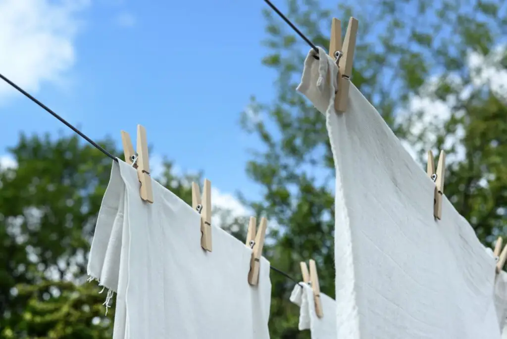 <p> Drying clothes outside on a sunny day may feel nostalgic and eco-friendly, but it can also violate HOA guidelines or even city codes in some communities. While 19 states now have “Right to Dry” laws that protect homeowners from clothesline bans, these don’t always override private neighborhood covenants. In places where rules are still enforced, visible clotheslines can be considered an eyesore. If you're passionate about cutting down on energy costs, look for retractable clotheslines that can be hidden when not in use, or ask your HOA if they allow drying racks in enclosed areas like patios or screened porches. </p> :: Pexels