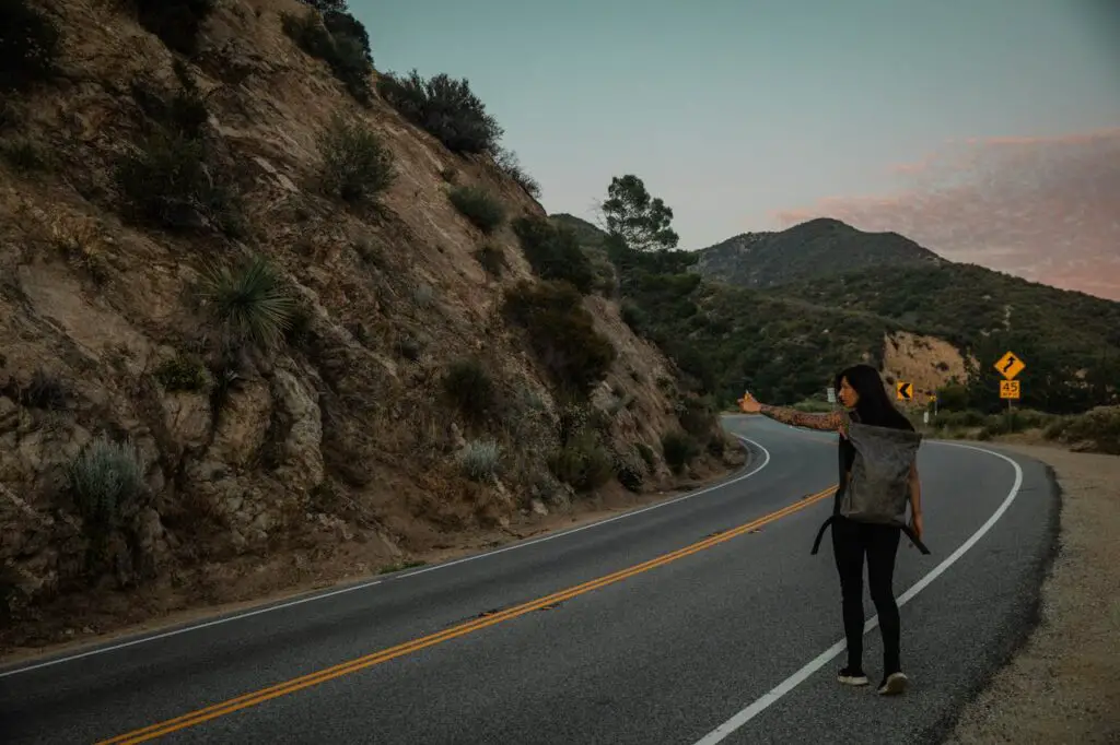 <p> Hitchhiking was once seen as a practical and adventurous way to travel. Travelers with thumbs out and signs in hand were a common sight along highways and interstates. But rising concerns about crime and personal safety led many regions to outlaw hitchhiking altogether. Laws now ban pedestrians from standing on highways or soliciting rides in many jurisdictions. Although still legal in certain areas with restrictions, hitchhiking has become rare, replaced by safer and more reliable transportation options like rideshare apps. </p> :: Pexels