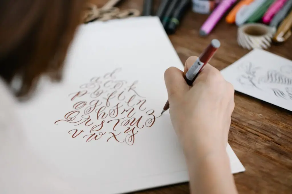 <p> If you love the idea of turning ordinary words into stunning artwork, hand lettering and modern calligraphy are fantastic hobbies that require minimal tools. All you need is a set of brush pens or calligraphy markers and a smooth paper notebook or practice pad. This hobby involves learning how to craft beautiful letterforms, flourish designs, and combine different fonts in creative ways. Hand lettering is perfect for making personalized cards, decorative prints, or even sprucing up your journal pages. The rhythmic motion of lettering can be incredibly meditative, helping reduce stress and improve concentration. And because practice is key, you can start small with simple alphabets and gradually develop your unique style. It is a fun way to channel your creativity without needing a large supply stash. </p> :: Pexels