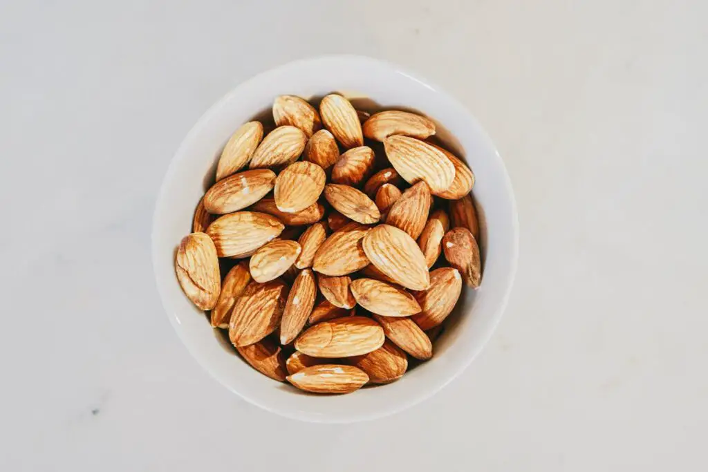 <p> Nuts are the kind of snack that feels like an indulgence but comes with big benefits. Almonds, walnuts, pistachios, and other tree nuts contain heart-healthy unsaturated fats, fiber, and plant sterols—all of which help reduce LDL cholesterol levels. Just a handful (about 1.5 ounces) a day is enough to help your heart without tipping the calorie scale. They also contain magnesium and vitamin E, which are great for overall cardiovascular health. Keep a jar on your kitchen counter for snacking, or toss them into your morning cereal or afternoon salad. And no, chocolate-covered doesn’t count (sorry). </p> :: Pexels
