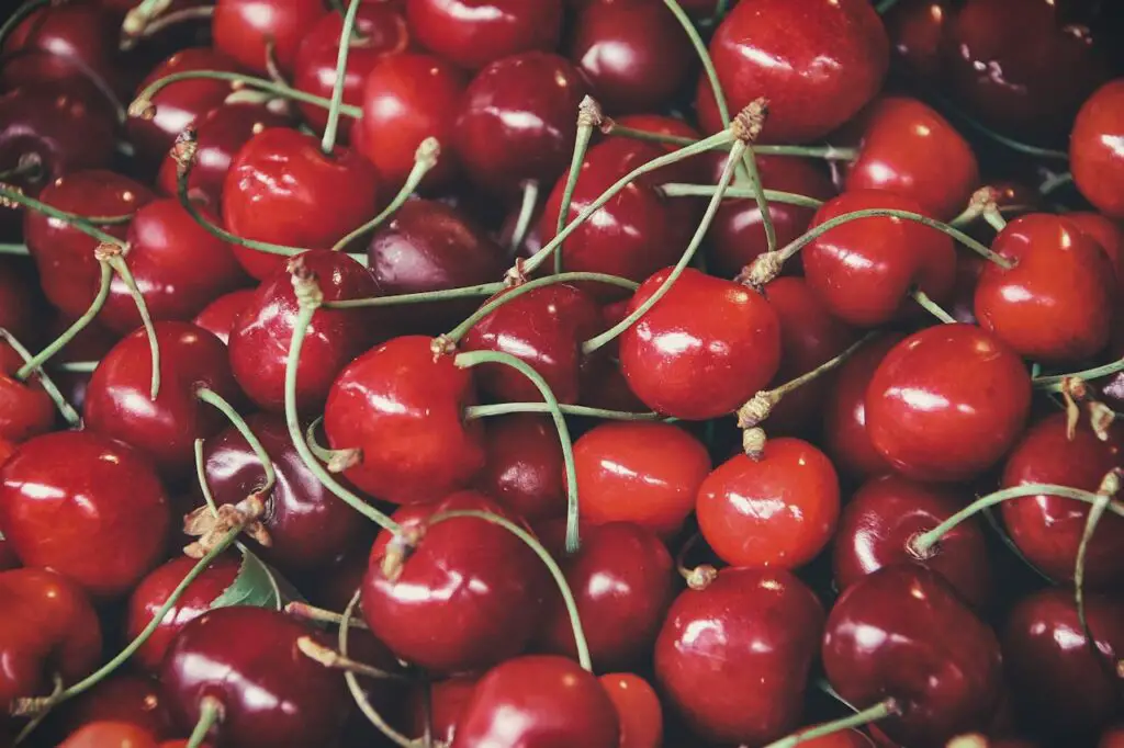 <p> Cherries are small, juicy, and a summertime favorite—but don’t let their size fool you. Just one cup of sweet cherries contains about 18 grams of sugar. Because they’re easy to pop into your mouth without thinking, it’s common to eat two or three servings in one sitting. If you enjoy cherries, measure your portion ahead of time and pair them with a handful of almonds or walnuts to slow down the sugar’s impact on your bloodstream. Also, opt for fresh over dried whenever possible, since dried cherries are even more sugar-dense. </p> :: Pexels