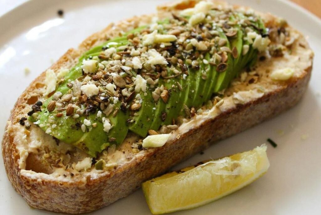 <p> Forget the basic avocado toast—this version takes things up a notch by adding extra flavor and nutritional value, all in under 10 minutes. Start by mashing half a ripe avocado with a dash of lemon juice, sea salt, and a pinch of chili flakes. Spread the mixture over a slice of toasted whole-grain bread. Then, top it with thinly sliced radishes, a sprinkle of hemp seeds, and a drizzle of extra virgin olive oil. If you’re looking for more protein, add a poached or boiled egg on top. This snack is rich in heart-healthy fats, fiber, and essential nutrients like potassium, making it a powerhouse for energy and satisfaction that feels indulgent while being entirely wholesome. </p> :: Pexels