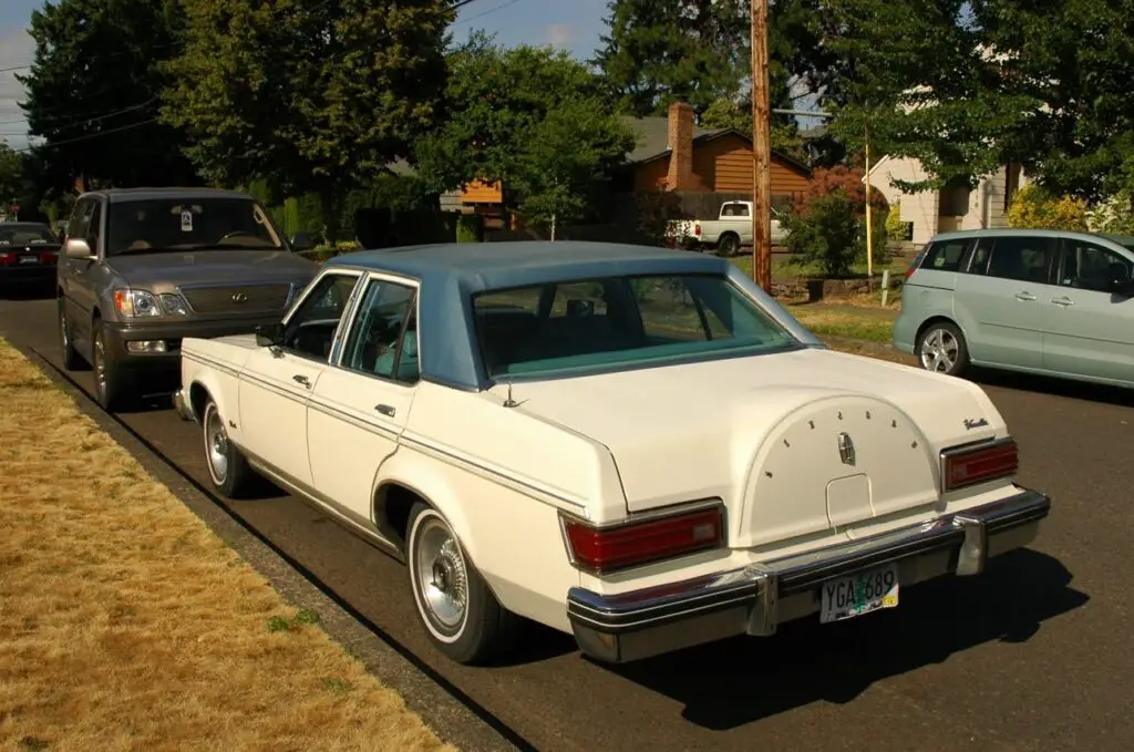 <p> Luxury badge, economy car roots. The Versailles was Lincoln’s attempt to compete with the Cadillac Seville, but underneath it was little more than a Ford Granada. With minimal styling changes and no real performance edge, it felt like a cash grab—and buyers knew it. It’s rarely considered collectible and doesn’t hold its value well. </p> :: OLD PARKED CARS.