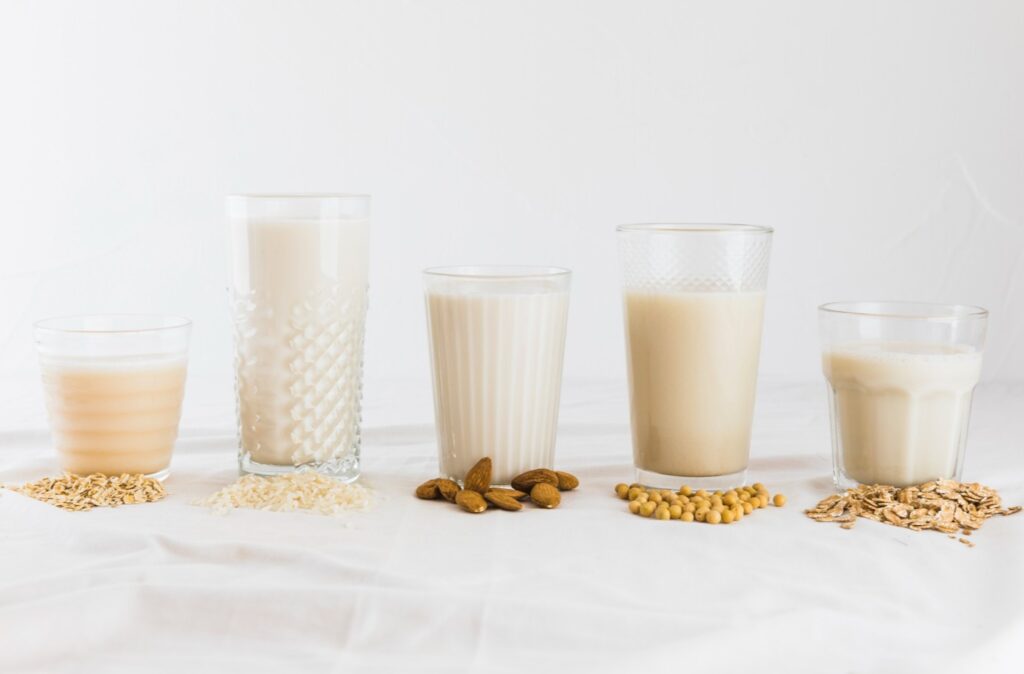 <p> Thinking about cutting back on dairy, but not sure where to start? You’re not alone. Across the U.S., more people than ever are ditching cow’s milk in favor of plant-based alternatives—and it’s not just about lactose intolerance. From heart health to weight loss to better digestion, there are lots of good reasons to make the switch. But here’s the kicker: many folks still believe plant-based milks are nutritionally inferior to dairy. That’s just not true. In fact, some plant-based milks are not only comparable to cow’s milk—they might actually be healthier. Whether you're after more protein, fewer calories, or just looking for a tasty addition to your morning coffee, there's a milk out there that's perfect for you. Let’s take a closer look at seven underrated plant-based milks that deserve a spot in your fridge. </p> :: Freepik