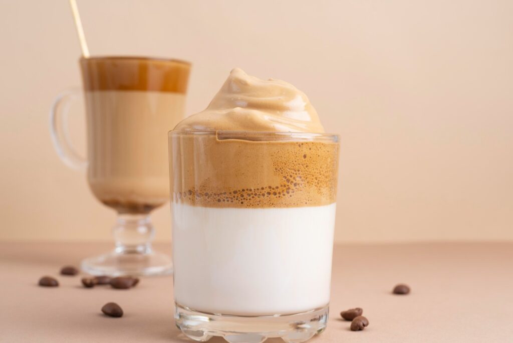 <p> This frothy internet sensation went viral for good reason—it’s fast, fun, and ridiculously satisfying. To make whipped coffee, combine 2 tablespoons each of instant coffee, sugar, and hot water. Whisk (or use a hand mixer) until the mixture turns thick and creamy. Spoon it over a glass of cold or warm milk, and stir to your preferred strength. It’s bold, sweet, and feels like a fancy café drink without ever leaving your kitchen. </p> :: Freepik