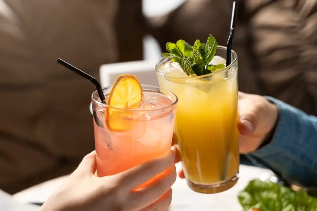 <p> Remember when not drinking meant awkwardly holding a glass of water while everyone else sipped something fun? Thankfully, those days are long gone. Today, choosing to go alcohol-free isn’t about missing out—it’s about showing up for yourself. Whether you're aiming for deeper sleep, clearer skin, better focus, or just fewer "oops" moments, skipping the booze has become a smart, empowering lifestyle choice. And guess what? You don’t have to give up the fizz, flavor, or fun. From gut-loving kombucha to chic mocktails and mood-boosting botanical blends, alcohol-free drinks have officially entered their glow-up era. They’re bold, functional, and honestly... kind of addictive (in the best way). Ready to upgrade your sipping game? Here are 14 delicious alcohol-free drinks that taste great, support your wellness goals, and make saying “no thanks” to alcohol feel like a total win. </p> :: Freepik