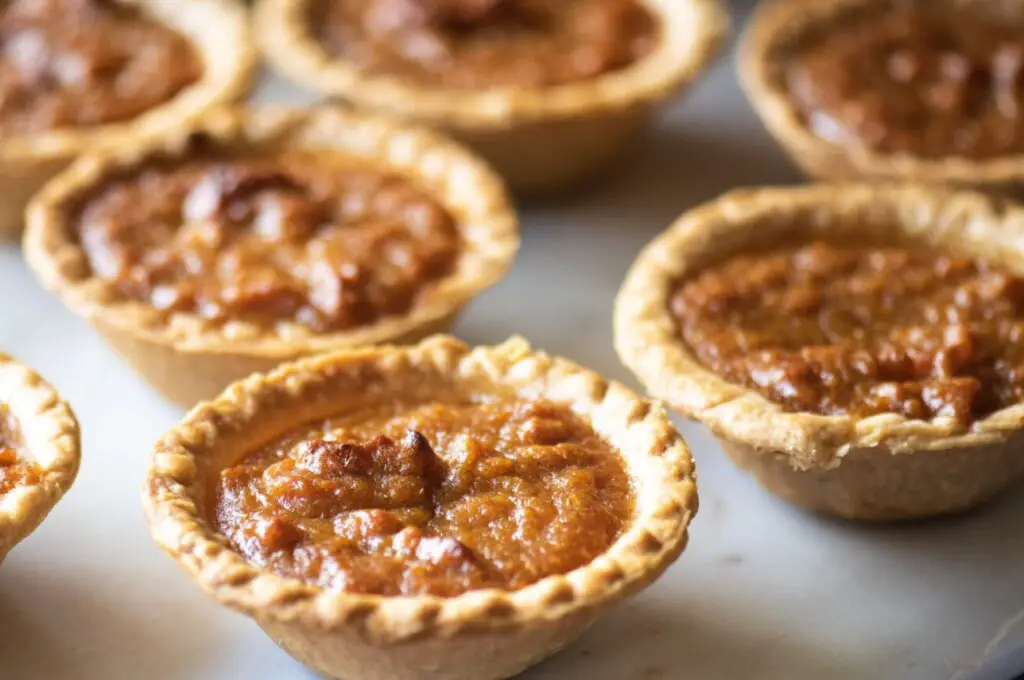 <p> Sweet potatoes are naturally sweet and packed with vitamins A and C, plus fiber that supports digestion. Mini sweet potato pie bites mix mashed sweet potatoes with warming spices like cinnamon and nutmeg, a little maple syrup, and a touch of vanilla, baked into small portions perfect for sharing or snacking. These bites are comforting, nutrient-dense, and perfect for holidays—or any day you want that warm, cozy dessert feeling. </p> :: Dude That Cookz