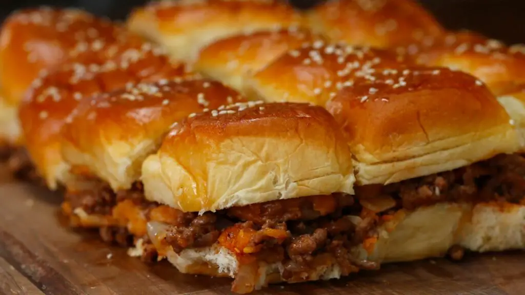 <p> Sloppy Joes are sweet, savory, and full of nostalgic goodness. Made with ground beef (or turkey), ketchup, mustard, and a bit of brown sugar, this classic sandwich filling is a hit with kids and grown-ups alike. Serve it on mini slider buns for a more manageable, fun-sized meal that’s easy to pick up and gobble down. You can round it out with a side of baked beans, corn, or simple coleslaw—all still very budget-conscious. </p> :: Tasty YouTube Channel