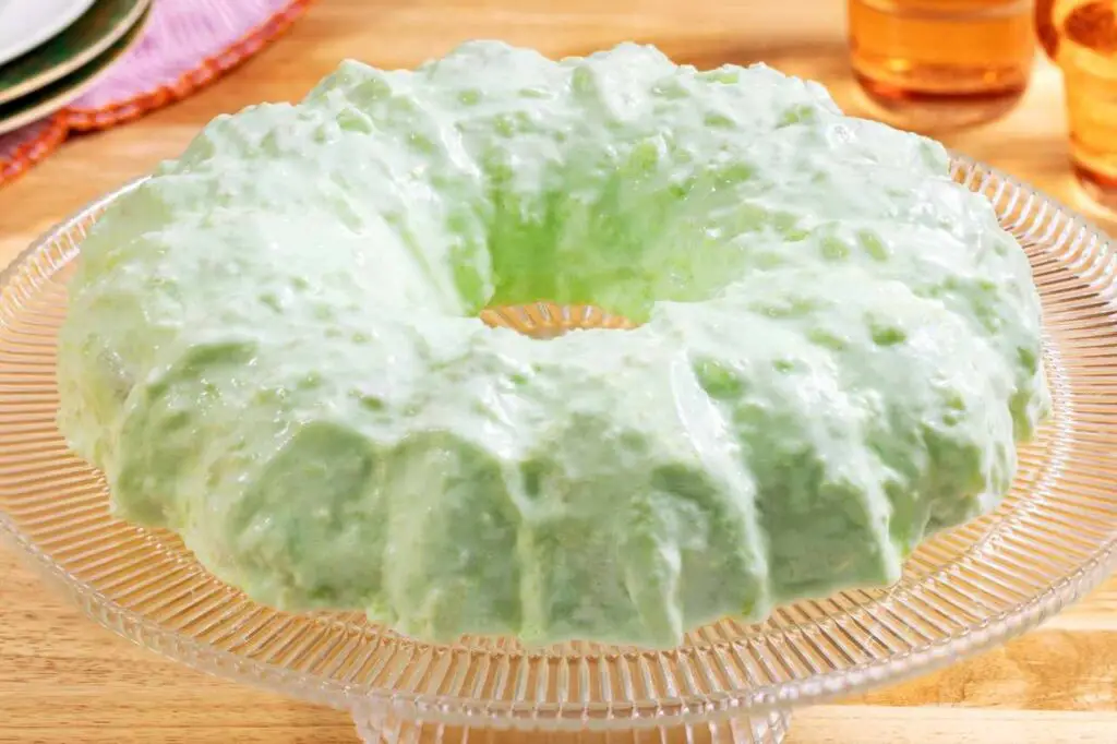 <p> A beloved oddity of the ‘60s, Seafoam Salad is one of those dishes that’s both quirky and charming. This shimmering lime Jell-O creation is mixed with cream cheese, canned pears, cherries, and whipped cream, making it part dessert, part salad, and entirely nostalgic. Though some might raise an eyebrow today, it still shows up at potlucks and family gatherings, especially for those who crave a taste of yesteryear’s quirky culinary trends. It’s a spoonful of sweet, tangy nostalgia. </p> :: Allrecipes