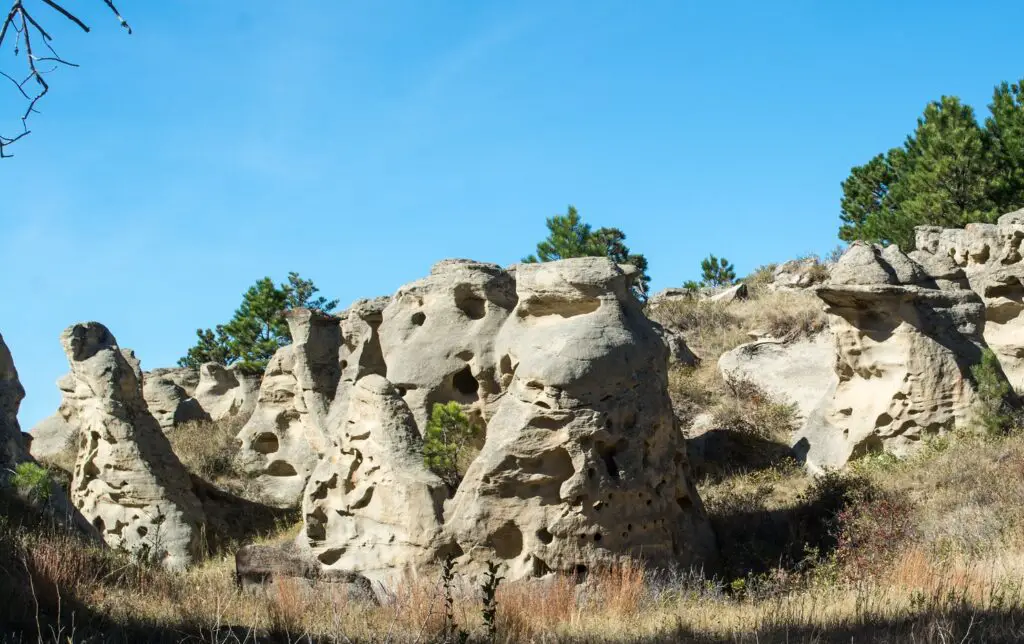 <p> For Boomers yearning for tranquility and a sense of wonder, Medicine Rocks State Park in eastern Montana feels like stepping into another world. Towering sandstone pillars, honeycombed with ancient carvings and wind-sculpted shapes, rise from the prairie in dramatic fashion. Indigenous tribes once regarded these rocks as sacred, and it’s easy to see why when the sunset paints them in pinks and golds. Hiking here is gentle and uncrowded, offering a meditative escape far from city noise. Bring your camera—the formations and wide-open skies are unforgettable. </p> :: Tim Evanson on flickr.com