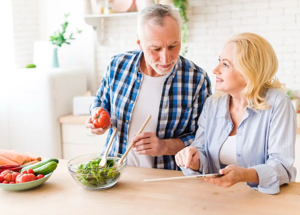 <p> What you eat plays a huge role in how you feel both physically and mentally. The Mediterranean-style diet, which emphasizes vegetables, fruits, whole grains, fish, nuts, and olive oil, has been shown to lower the risk of dementia and heart disease. It is also delicious and satisfying. Try swapping processed snacks for fresh fruit, or trade red meat for salmon once or twice a week. Cooking with friends or family can also turn healthy meals into fun social events. </p> :: Freepik