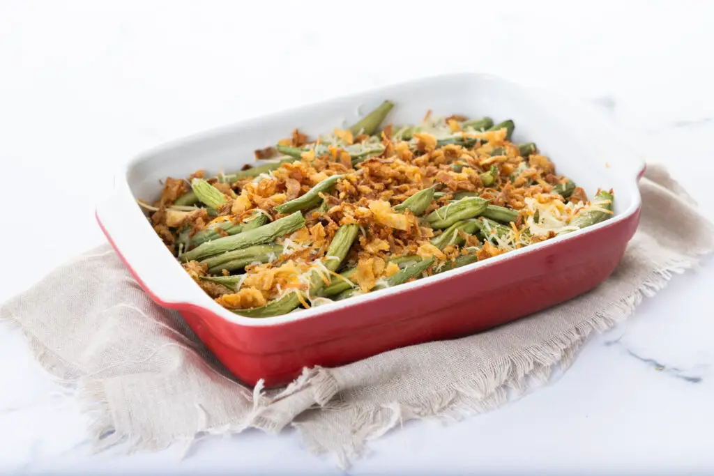 <p> Created by Campbell’s in the 1950s, this dish combined green beans, cream of mushroom soup, and crispy fried onions. It became a must-have at Thanksgiving, but many boomers grew up eating it year-round. One bite brings back holiday memories and the sound of aluminum pans scraping clean. </p> :: Freepik
