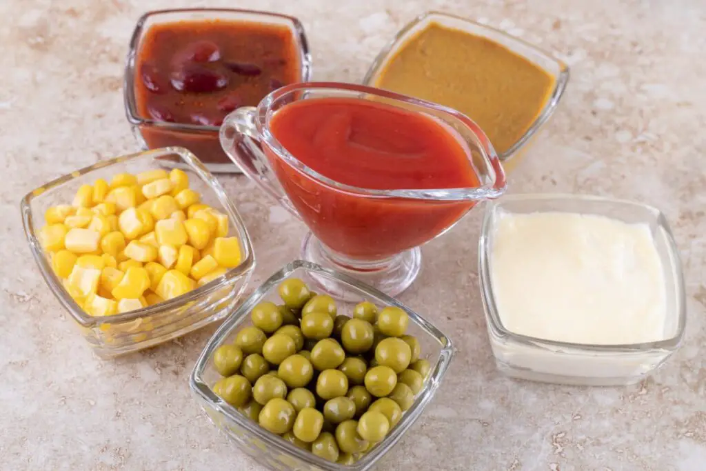 <p> Creamy condiments like mayonnaise and homemade salad dressings separate when frozen. The oil and water components split apart, leaving behind an unappetizing texture that looks curdled. The same goes for creamy sauces such as ranch or Caesar. While store-bought versions with stabilizers may fare slightly better, homemade dressings should always stay in the refrigerator. If you love making your own, whip up smaller batches so they are always fresh and ready to use. </p> :: Freepik