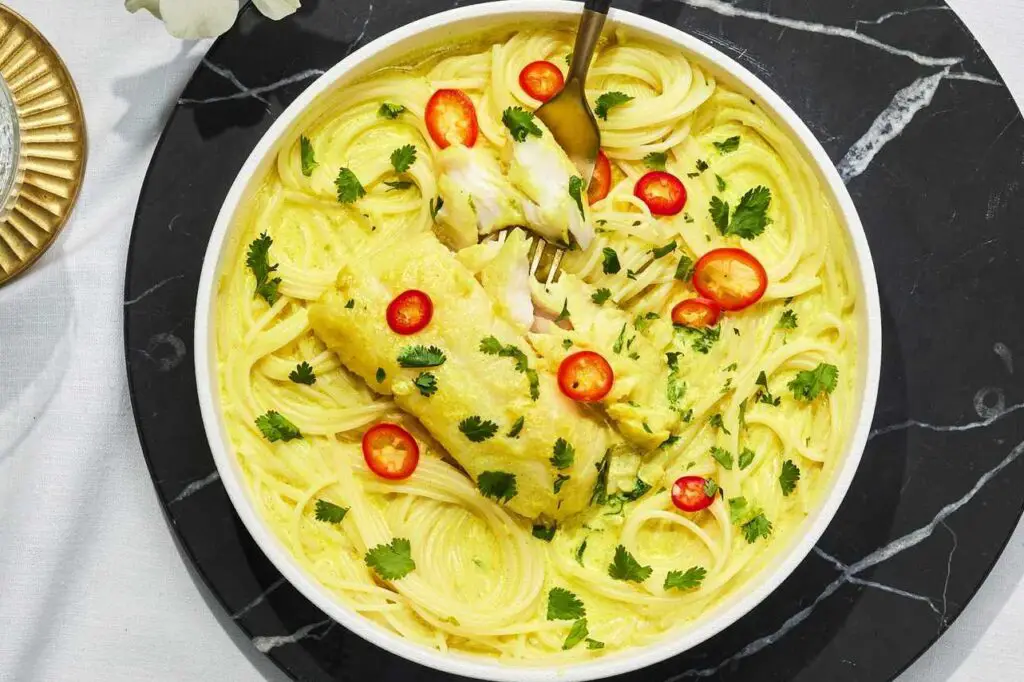 <p> If you like meals that are light yet comforting, this one is for you. Cod is a lean, omega-3-rich fish that pairs beautifully with a turmeric-spiced coconut broth. The turmeric adds anti-inflammatory benefits, while the noodles and vegetables round out the meal with fiber and vitamins. This dish is soothing, flavorful, and easy to digest—making it a perfect choice for a satisfying but gentle dinner. </p> :: realsimple.com
