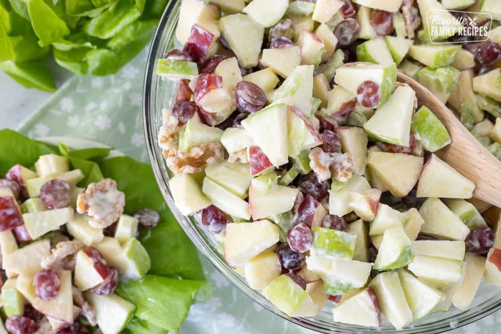 <p> A crunchy mix of apples, celery, walnuts, and grapes held together by mayonnaise or yogurt, Waldorf salad brought elegance to the table. Originally created at the Waldorf-Astoria Hotel, it trickled down into suburban kitchens where boomers remember it as a refreshing and slightly fancy side dish at family dinners. </p> :: Favorite Family Recipes | favfamilyrecipes.com
