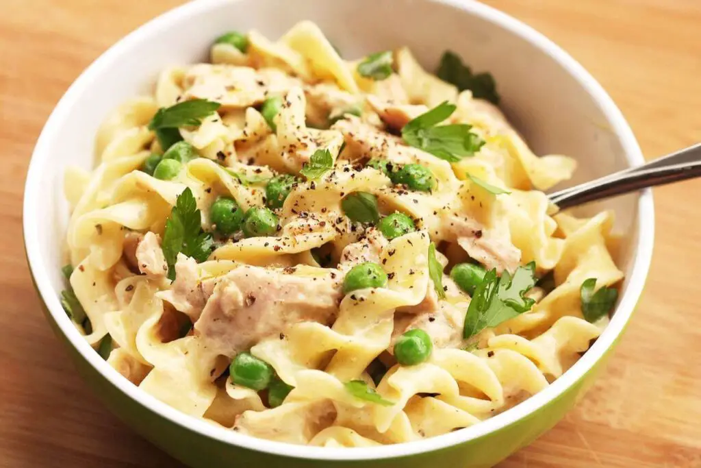 <p> This creamy casserole was the ultimate “what’s-in-the-pantry” dinner. Egg noodles, canned tuna, and cream of mushroom soup came together in a dish that was easy, affordable, and comforting. Often topped with crushed potato chips or breadcrumbs, it was a staple for busy weeknights and a familiar favorite at community potlucks. </p> :: Serious Eats | seriouseats.com