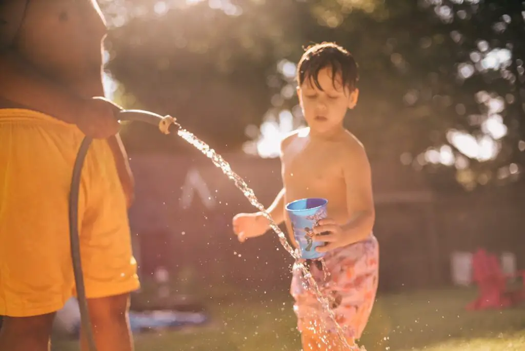 <p> After hours of running around, nothing tasted better than water straight from the garden hose. No bottled water, no filters—just good old-fashioned hose water that came out a little warm at first but hit the spot when you were parched. It might not have been the cleanest, but it never seemed to hurt us. Nowadays, parents carry refillable bottles with filtered water and worry about contamination, bacteria, or chemicals. But for us, a gulp of hose water was all we needed to get back in the game. </p> :: Pexels
