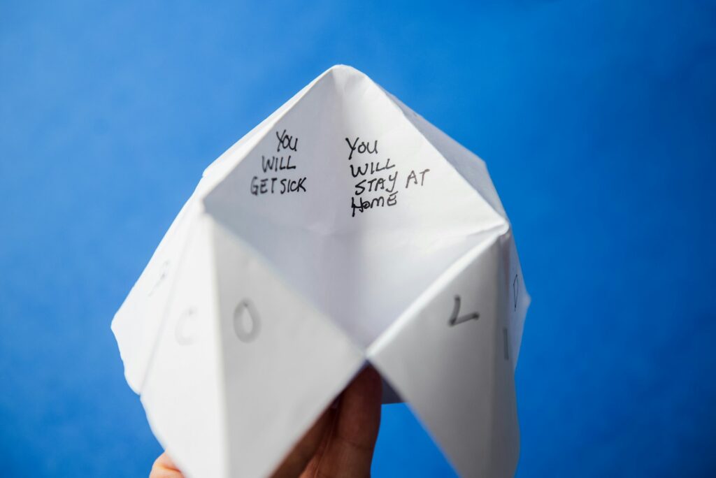 <p> Paper fortune tellers, sometimes called cootie catchers, were once a playground favorite. They were simple to make, but somehow always felt a little magical.

All it takes is a square piece of paper and a few folds. Once you have the shape, you can fill each section with colors, numbers, and short messages. You can keep it light with funny predictions or make it more personal with encouraging words or inside jokes.

What makes this craft stand out is that it is interactive. It is not something you just create and set aside. You use it with other people, which brings a sense of connection and playfulness that is often missing in everyday routines. It is a small way to bring laughter into a moment, whether you are with friends or just taking a break for yourself. </p> :: Unsplash