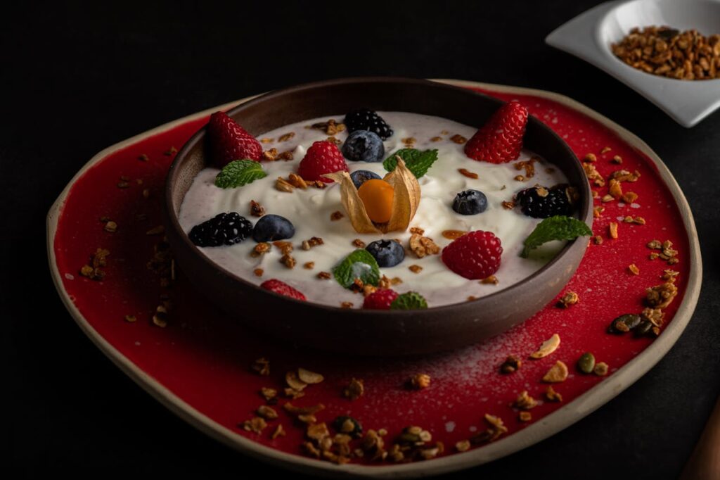 4. Yogurt <p> Yogurt is more than just a creamy snack or a breakfast sidekick. It contains probiotics, live bacteria that support a healthy gut microbiome, aiding digestion and even boosting the immune system. On top of that, yogurt is a good source of calcium, vitamin D, and protein, which are all essential for maintaining bone strength and muscle mass as we age. Boomers might remember yogurt as a convenient snack or a treat, but it was quietly helping maintain digestive health and overall wellness. You can easily pair it with fresh fruit, a handful of nuts, or a drizzle of honey to make it even more satisfying. Incorporating yogurt into daily routines is a simple step with significant health benefits, especially for those focused on long-term wellness. </p> :: Pexels