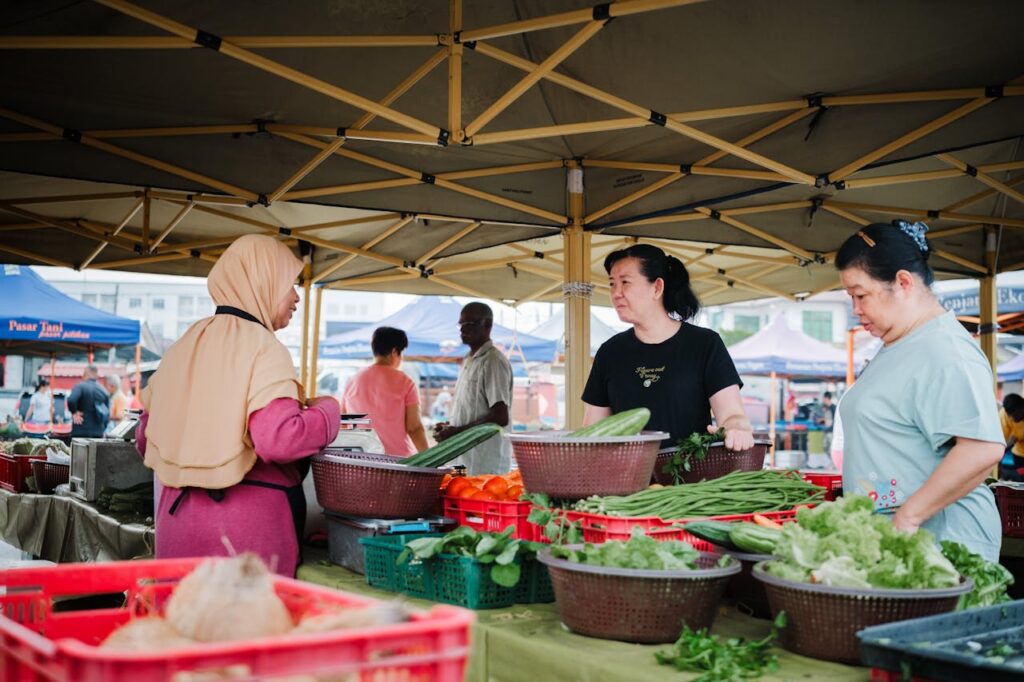 <p> Markets are more than places to buy things. They are social spaces where people naturally slow down, browse, and talk.

When local vendors set up stalls, it creates opportunities for small conversations that would not happen in a regular store setting. People ask questions, learn stories behind products, and interact with neighbors they might normally pass by without noticing.

Adding simple elements like live music or local food makes the atmosphere even more inviting. People do not just shop. They stay, wander, and connect. </p> :: Pexels