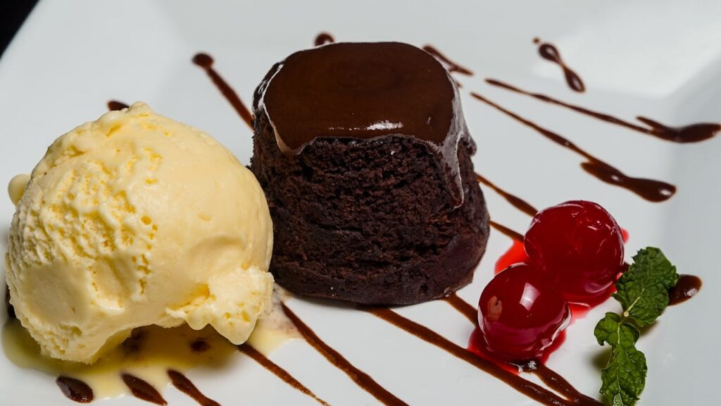 10. Molten Lava Cake with Ice Cream <p> When it comes to dessert, few things deliver a full sensory experience like molten lava cake. The moment you cut into it and the warm chocolate center flows out, it creates a sense of anticipation and satisfaction at the same time. The rich aroma of chocolate makes it even more inviting. Pairing it with cold ice cream adds contrast, both in temperature and texture. You get a mix of warm and cool, soft and slightly firm, all in one bite. It is simple to prepare but feels like a treat you would save for a special occasion. </p> :: Pexels